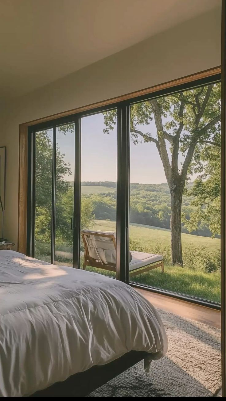 Dormitorio con ventanal al paisaje